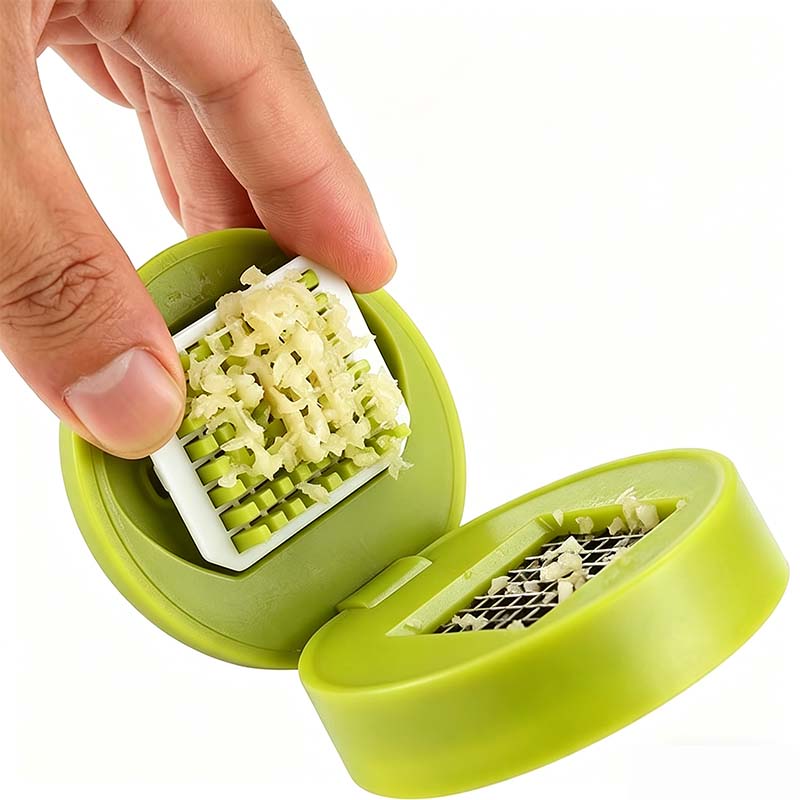 Mincely™ – One-Press Stainless Steel Garlic Chopper with Catch Container + 50% OFF